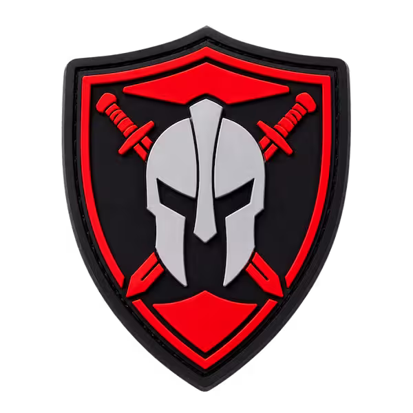 2D PVC patch featuring Spartan helmet shield and crossed swords with clean molded rubber details for tactical branding use